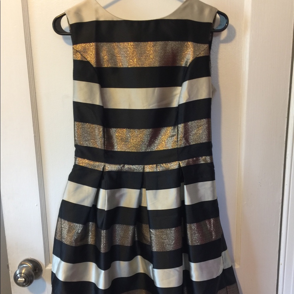 Black and gold fit and flare dress